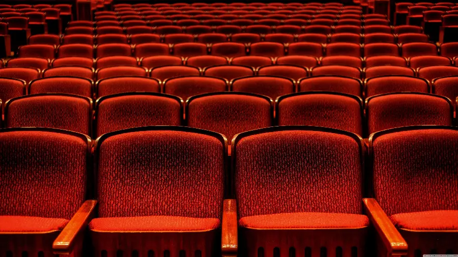 HD photo of the red chairs arranged in the theater