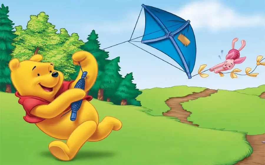 Photo of a kite flying with a special design by Pooh the kind yellow bear 