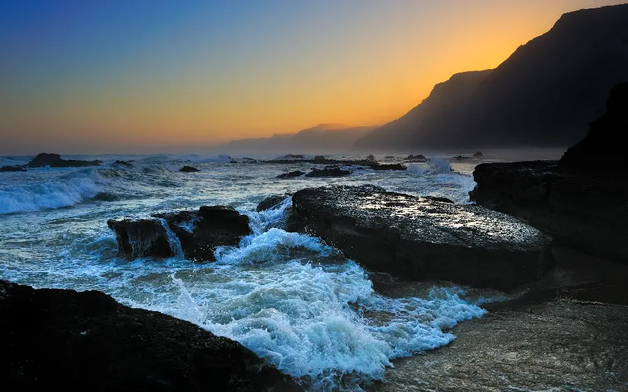 The most mysterious view of waves and rocks and the raging sea 