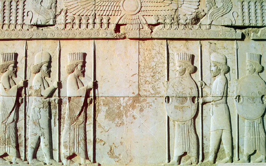 Background photo of wall reliefs in the style and art of Iranian architecture