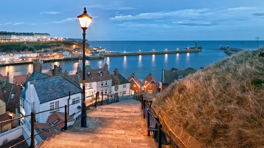 Wallpaper of a port city with dreamy houses and sea views
