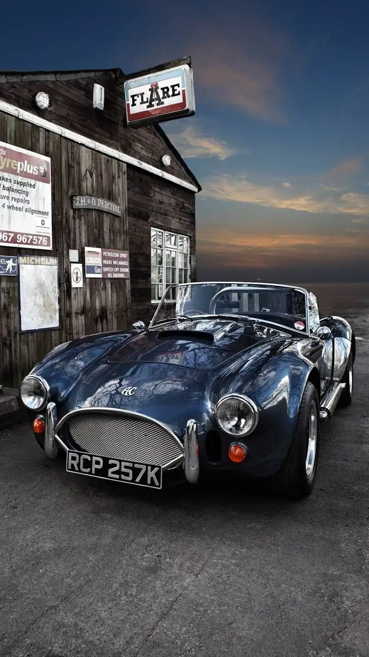 Wallpaper with an interesting and beautiful design of an old sports car 