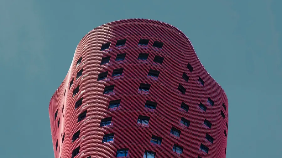 Download a special and spectacular modern and real building with a blue sky 