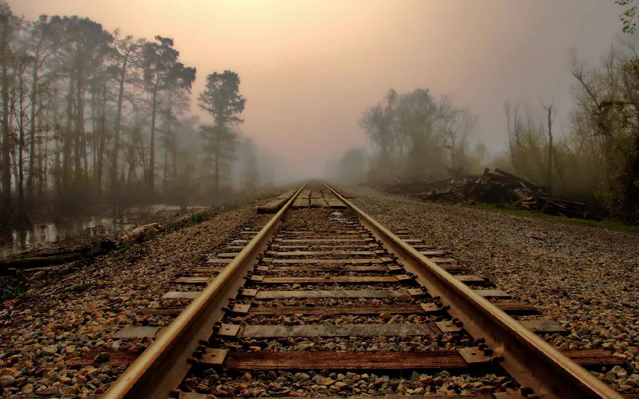 Stock photo 4k railway track without train with sunset view 