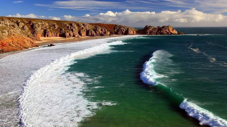 Download the most awesome wallpaper of a real rocky sea beach 