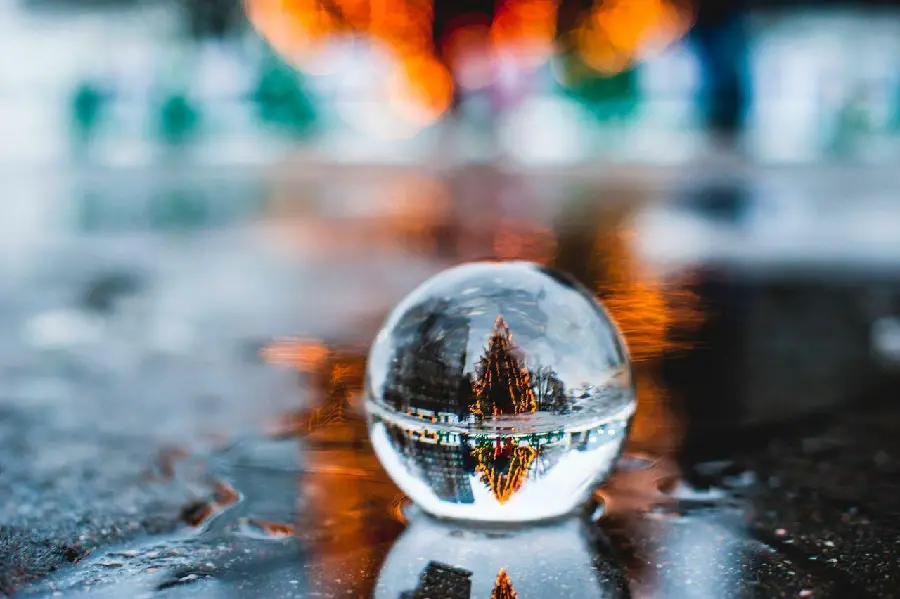 Photo of a clear crystal and glass ball suitable for use as table decorations 