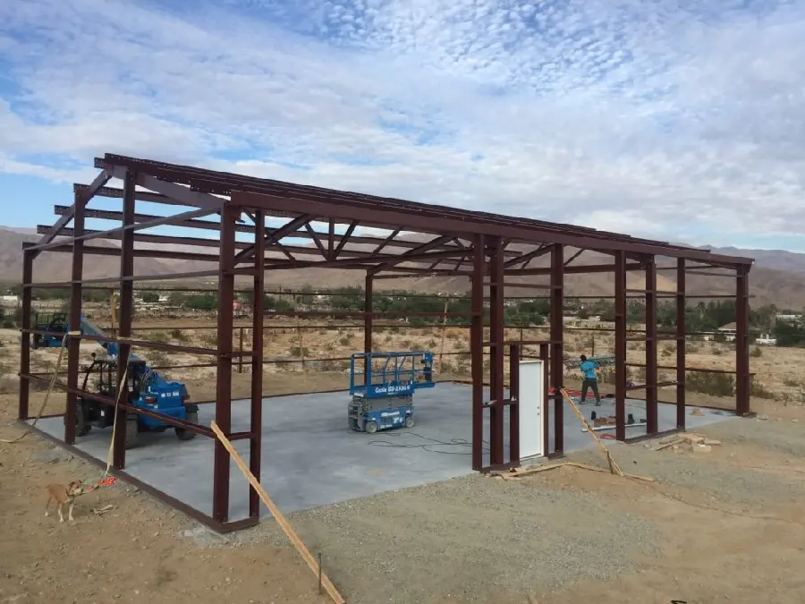 Photo of a metal and steel building under construction