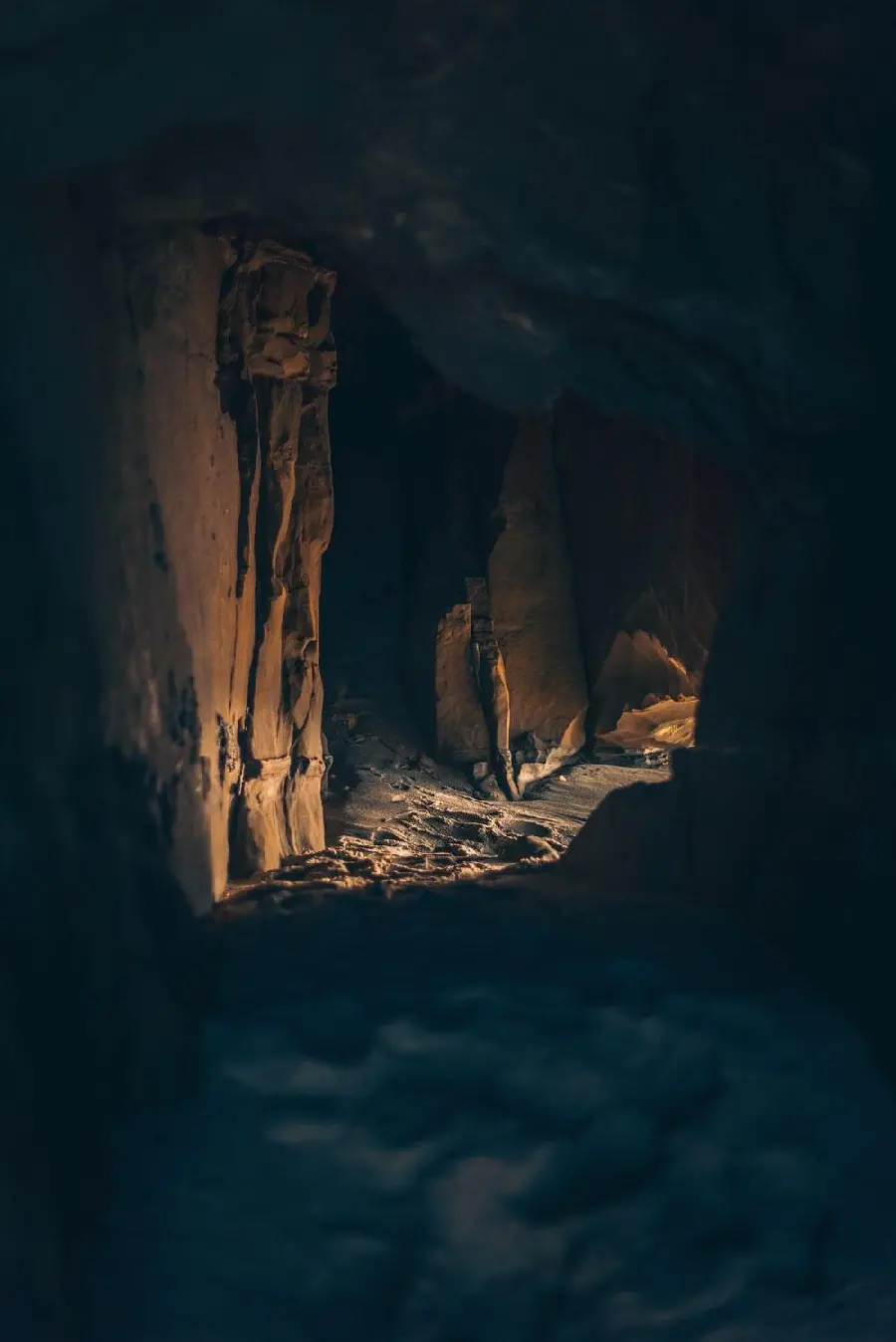 Dark and scary cave entrance stock photo for free download