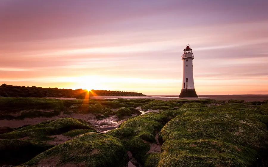 Attractive background photo of a lighthouse in a beautiful and spectacular landscape