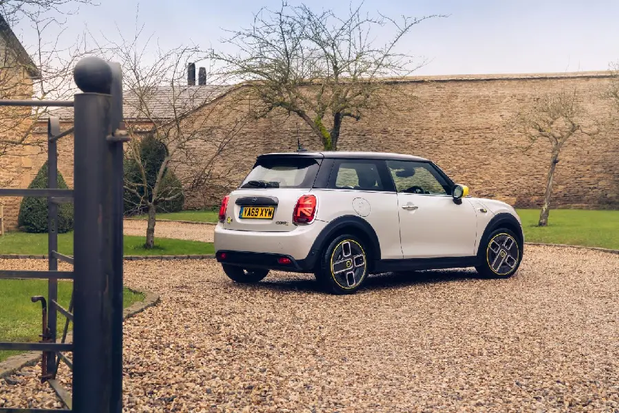 Wallpaper for boys with a new design of a small compact white electric car