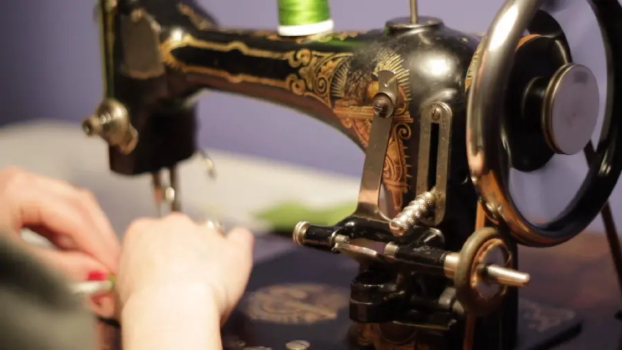 Photo of a classic and manual sewing machine for home sewing and embroidery
