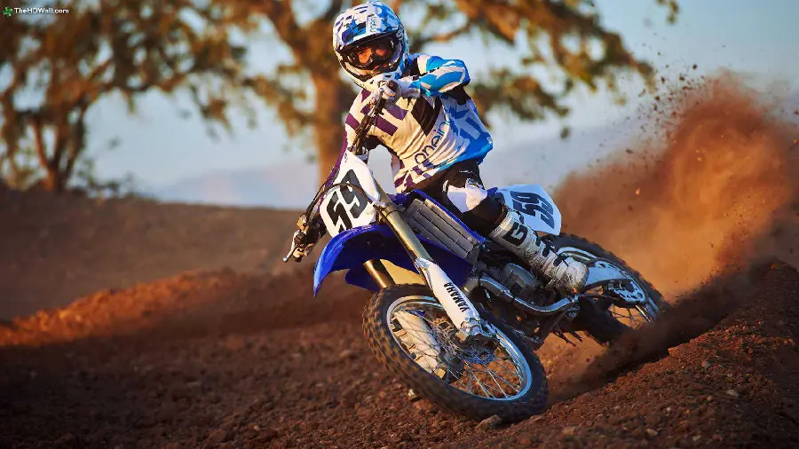 Children's Motorcycle Riding on a Dirt Road with Motocross