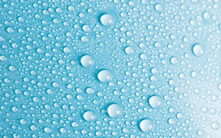Wallpaper of cool water drops on a blue background for design and photoshop work