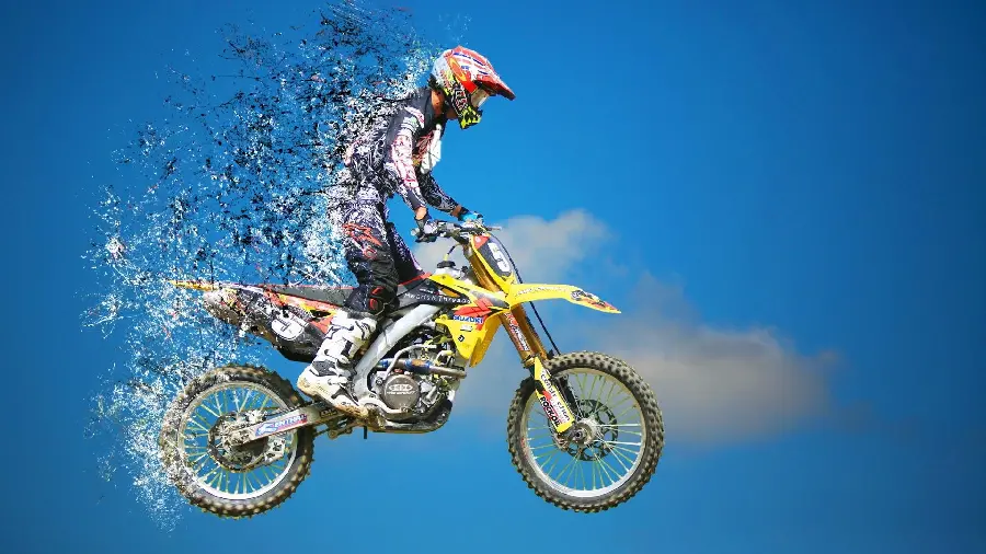 Freestyle motorcycle racing and jumping cross wallpaper in 4k quality