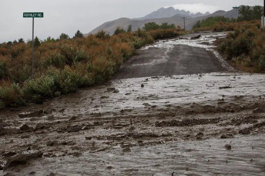 Awesome and fascinating background of a muddy rain-swept road by Jeff Sullivan