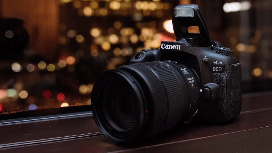 Canon EOS 90D camera profile photo microphone input port and USB-C port with Wi-Fi and Bluetooth connectivity