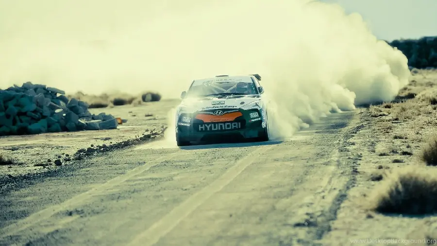Background image of a Hyundai car performing in a rallycross race