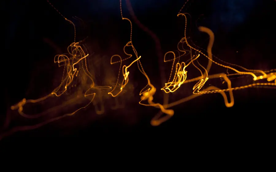 Wallpaper of light lines on a black background 2024