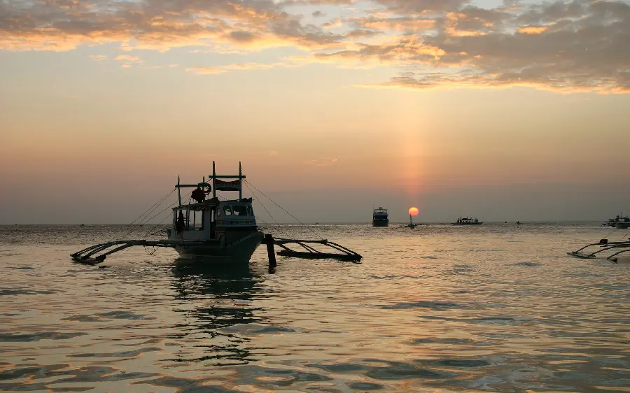 Image of a boat in calm water without waves at sunset, special for laptops 
