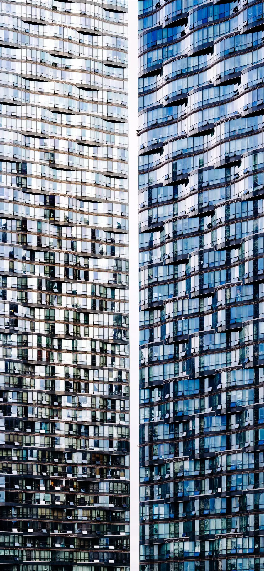 Photo collage of modern black and gray glass panel building