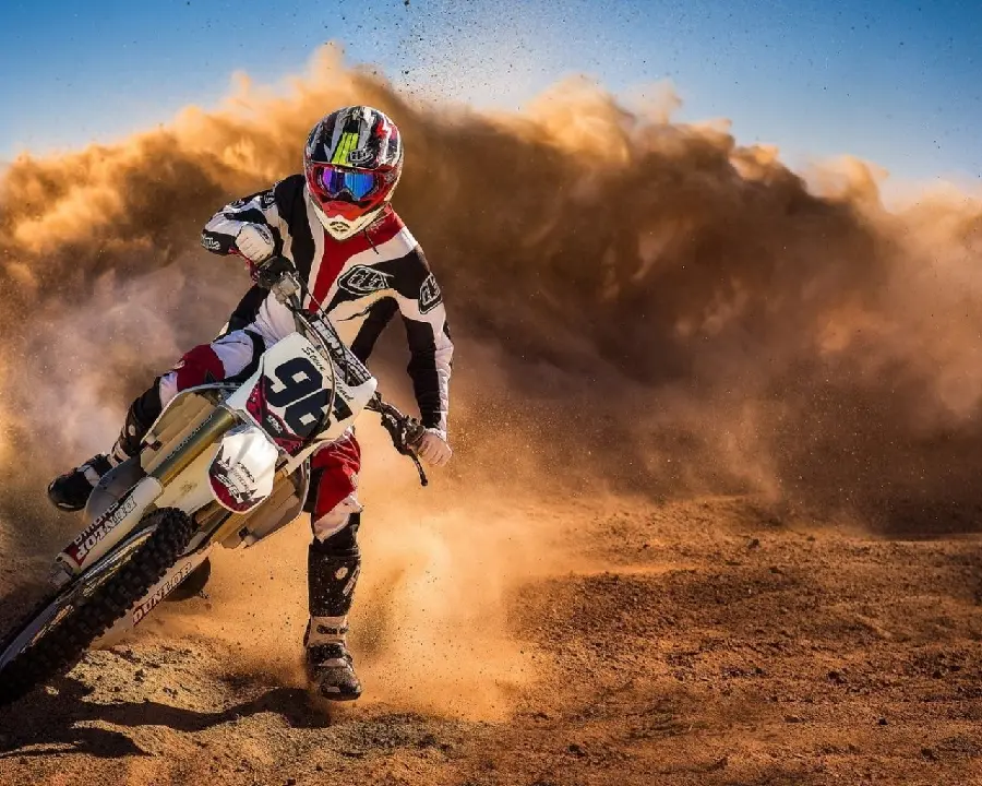 Speed ​​and excitement background with the ear-splitting sound of motocross in the heart of the desert