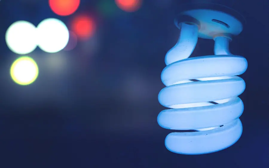 Photo of a low-energy LED screw light bulb with a blurred background