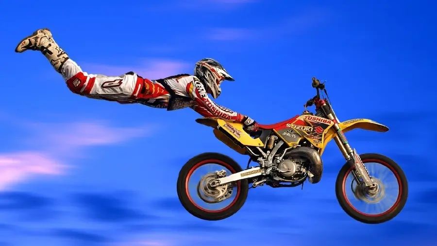 Wallpaper of jumping with a motorcycle or motocross in the background of the follow