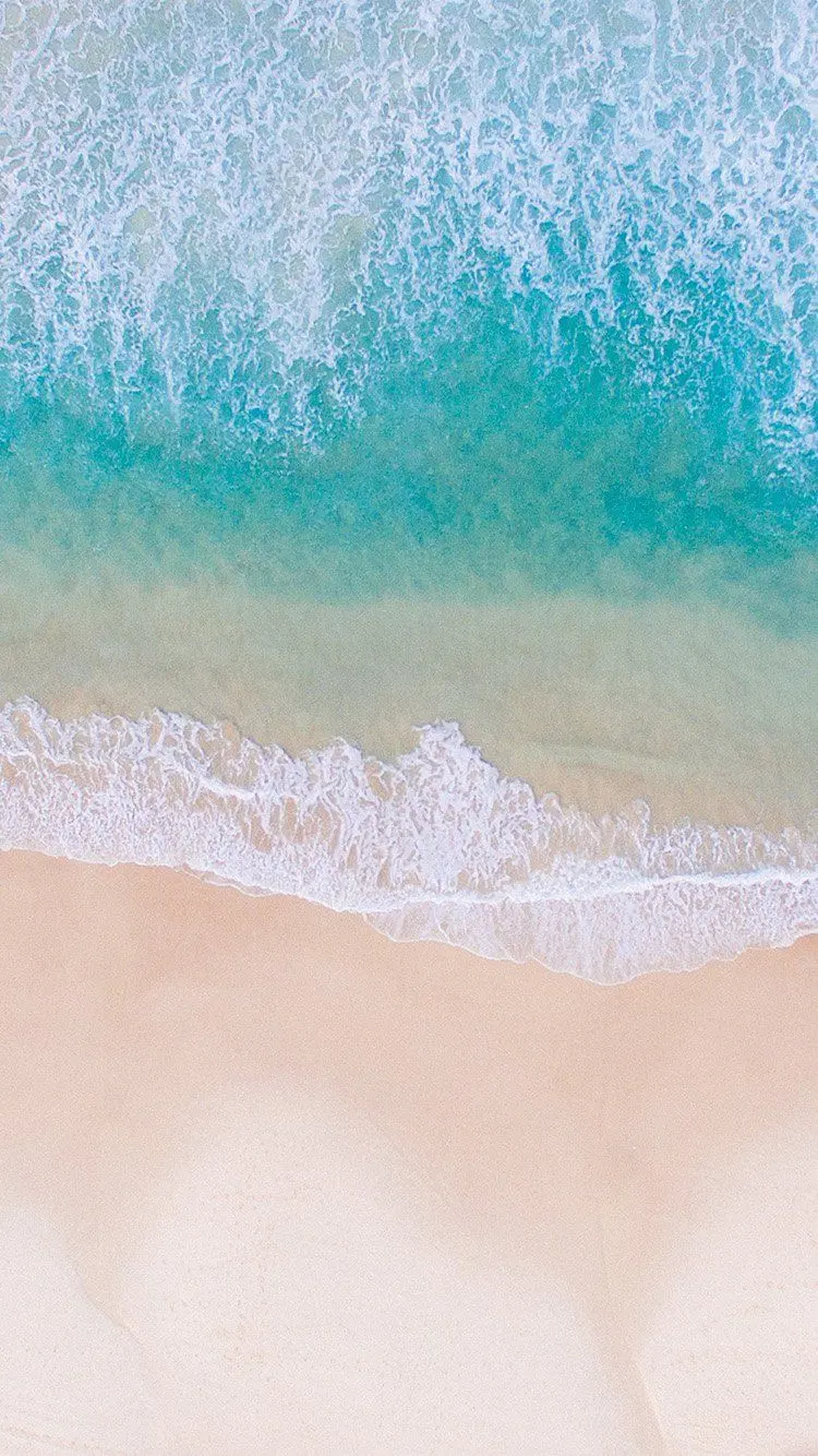Background and wallpaper of sea water and sandy beach in HD quality 