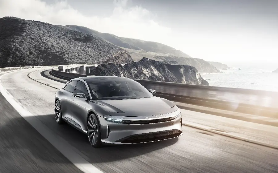 Download the most awesome photo of silver electric car on the road 