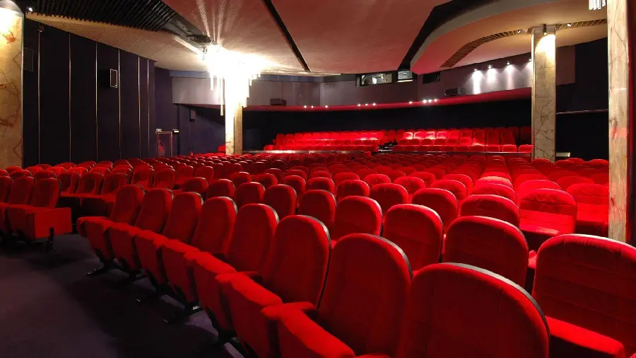 Photo taken of the interesting view of the theater hall and red seats