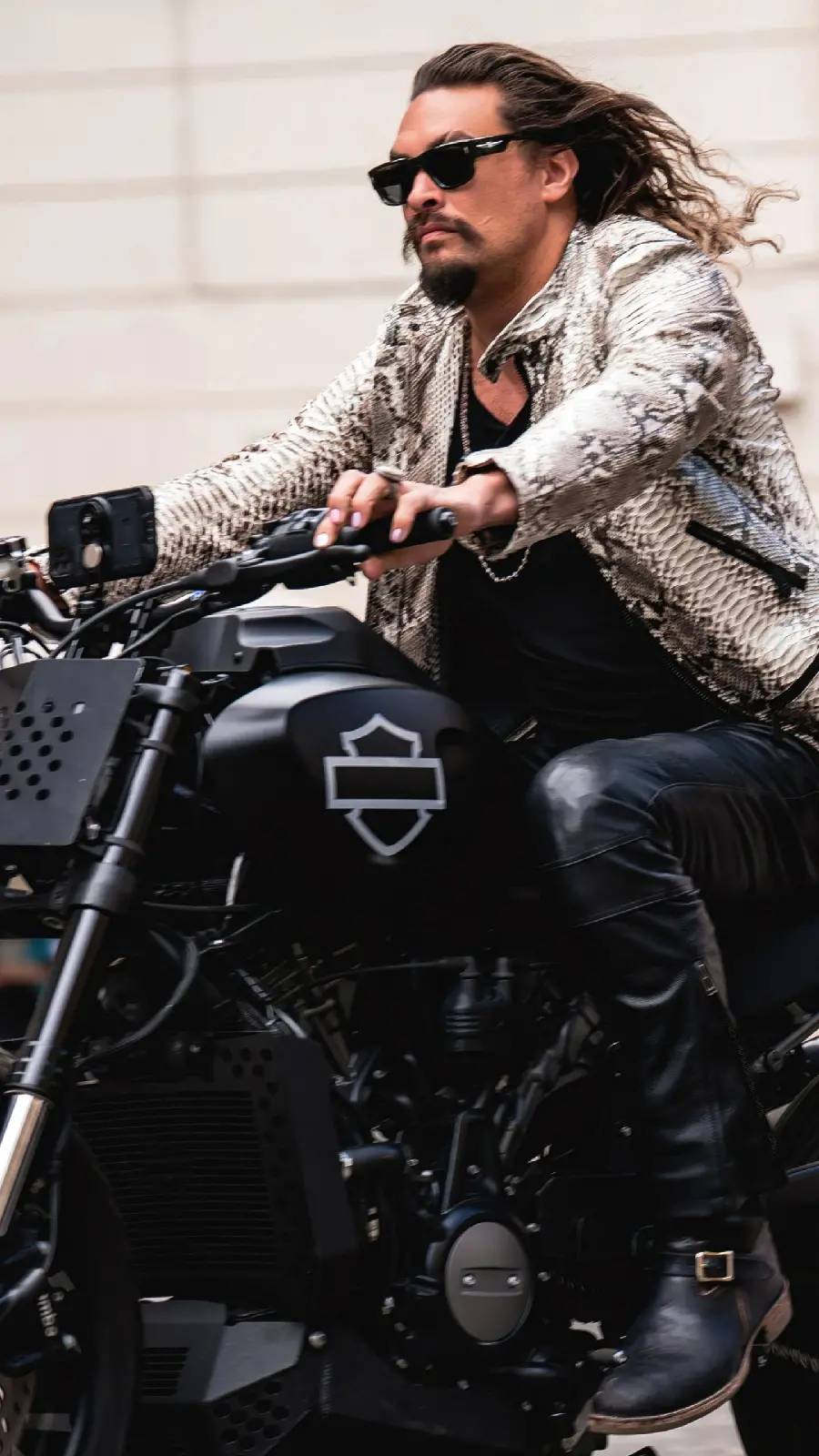 Wallpaper of Jason Momoa on a motorcycle in the Fast and Furious 10 Fast X movie for your phone