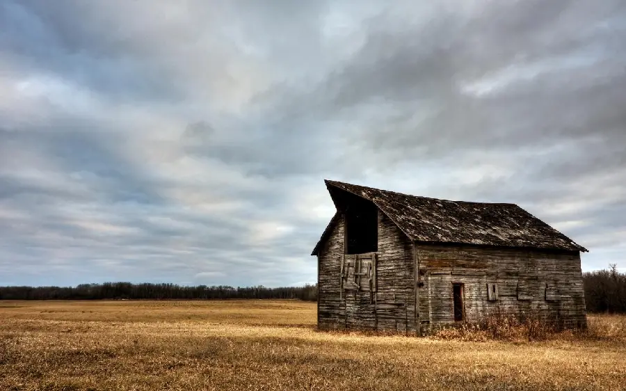 Download beautiful photo of old and dilapidated wooden barn in the meadow