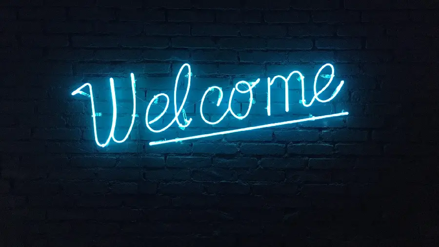 Wallpaper of a decorative neon sign of a coffee shop with a Welcome design in HD quality