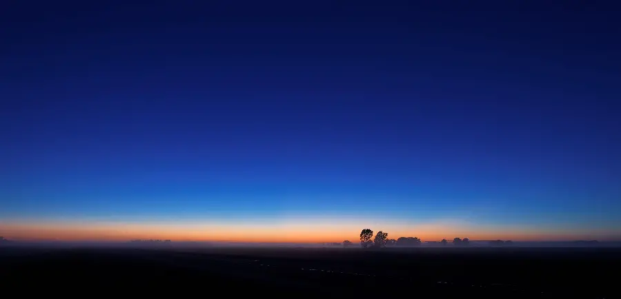 Background and Wallpaper of a calm blue sky sunrise in high quality