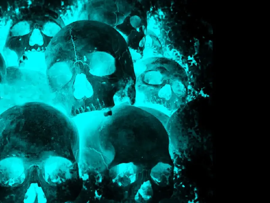 Fantasy and scary photo of human skulls with blue lighting 