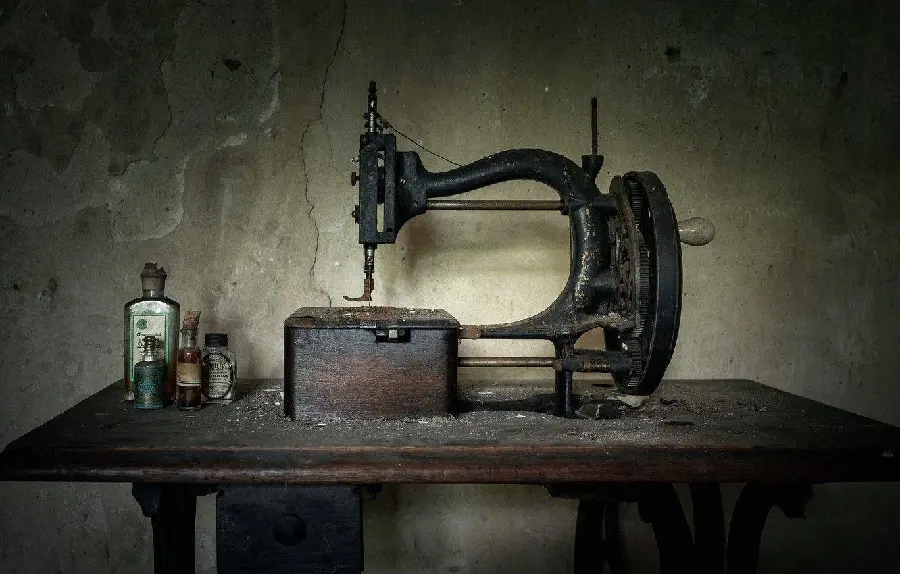 Background photo of the first home and tabletop sewing machines 