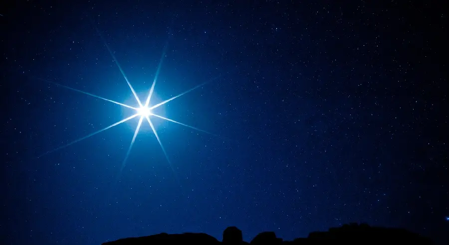 Stylish wallpaper of the night sky and twinkling stars for a square LCD monitor