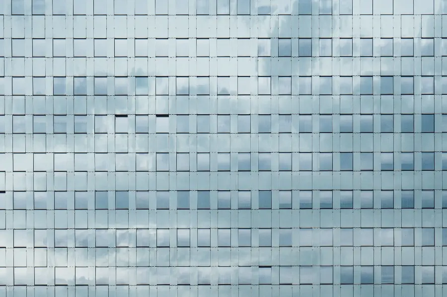 Photo of glass facades of residential apartment complexes 