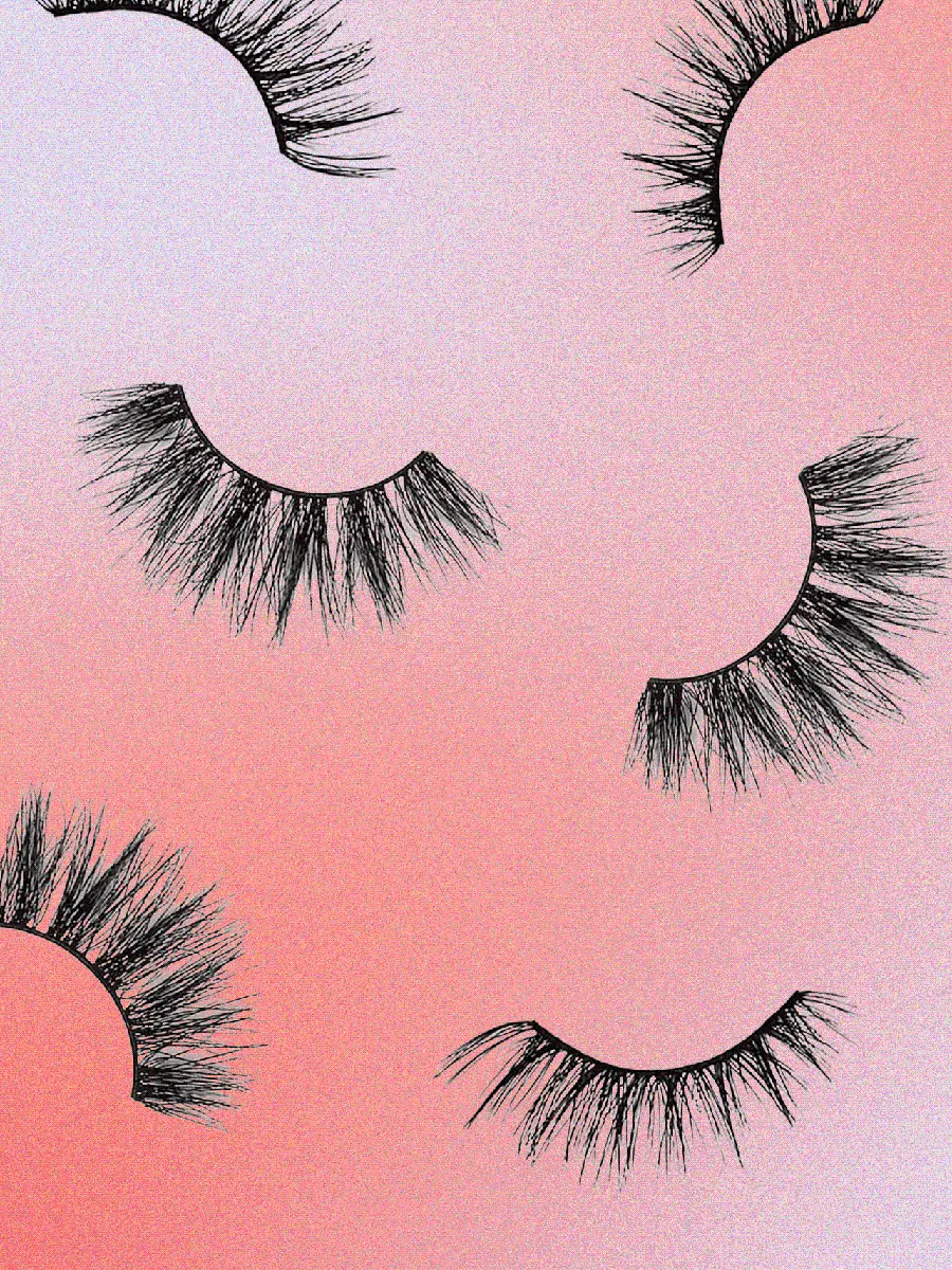 Download photo of false eyelashes on a pink background