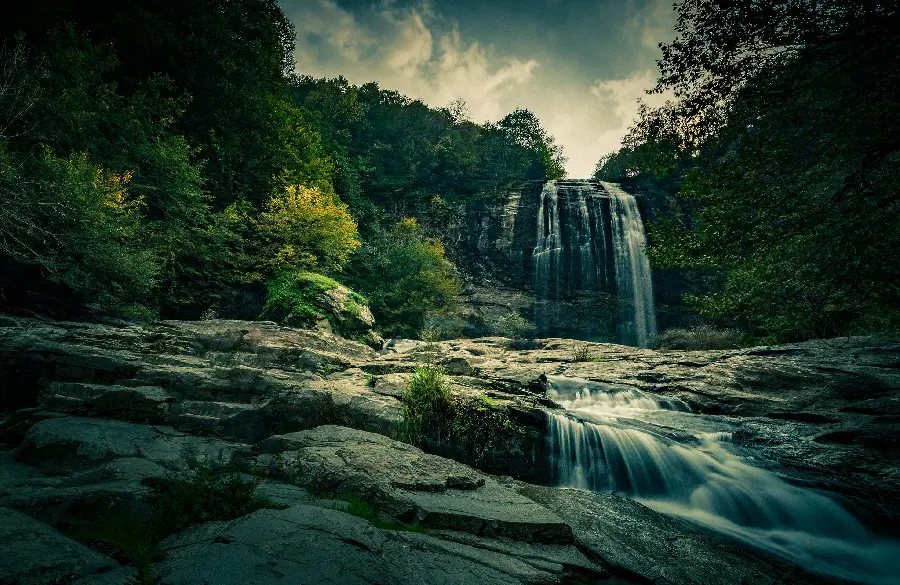 The most beautiful and lush nature photo with waterfall and river