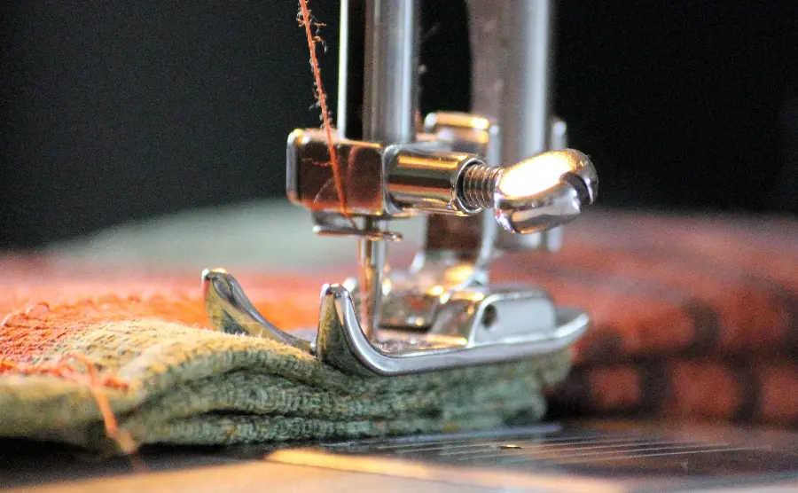Photo of fabric being sewn by a high quality sewing machine 