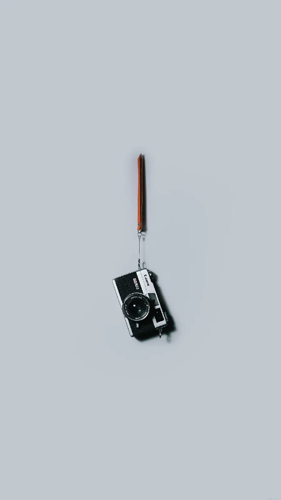 The cutest wallpaper of 2023 with a camera design and a simple background 