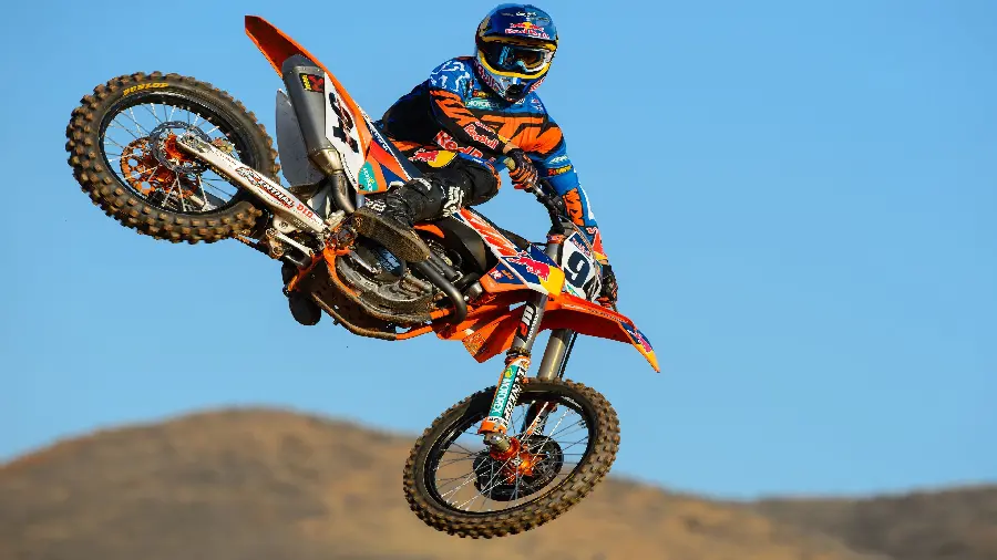 Stock photo of a motocross jump in the blue sky 4k