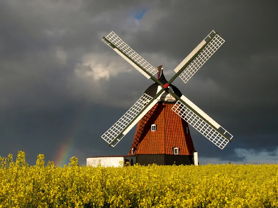 Wallpaper with a windmill design in the middle of nature With amazing view 