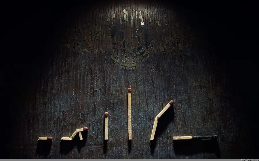 Stock photo concept image of broken matchsticks on a black background
