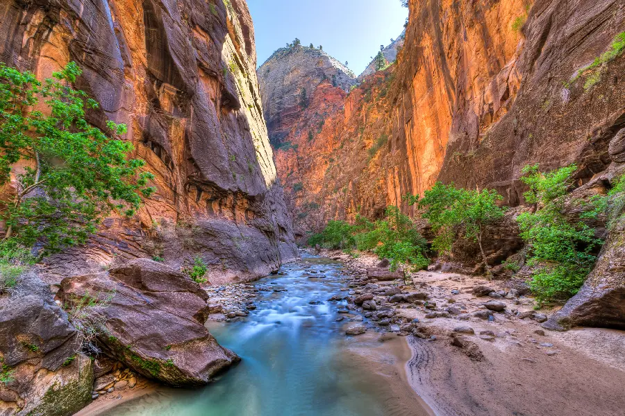 Photo of a river between the highlands