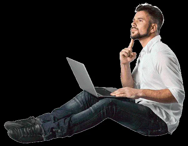 PNG image of a young man working on a laptop in a thinking state
