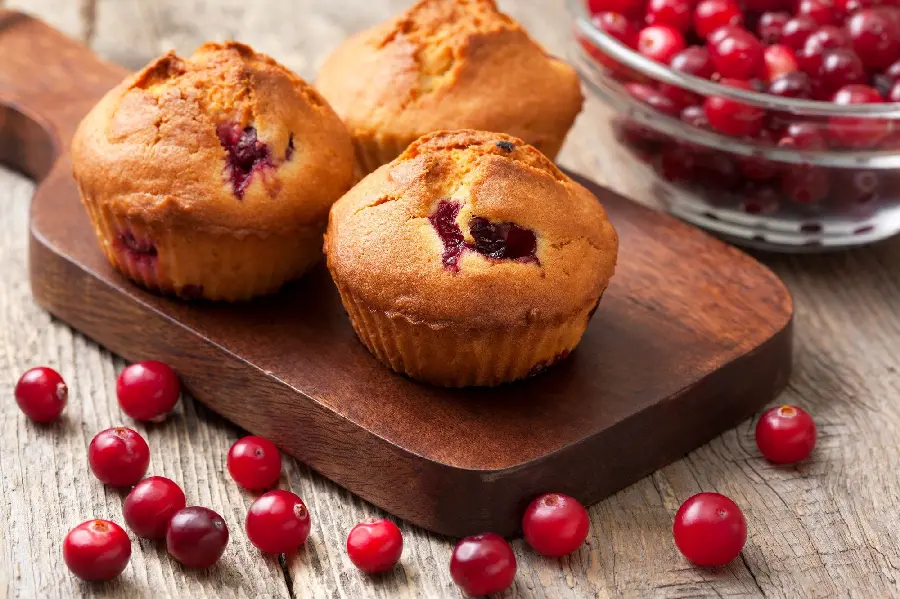 Download the photo of a delicious blueberry cookie with pieces of summer fruits 