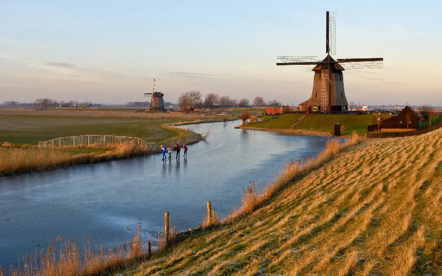 Landscape and coastal nature outside the city and a calm narrow river