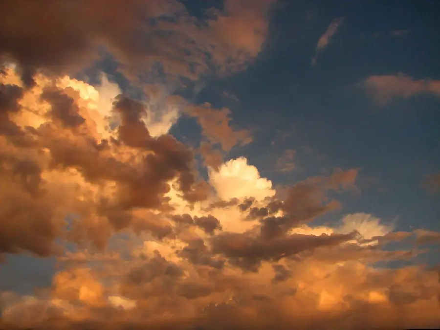 Beautiful photo of clouds floating in the sky by Maxfield Parrish 